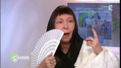 Brigitte Fontaine... in her Arabian headdress... and ivory fan...