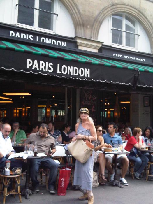 In front of the.. Paris London café...